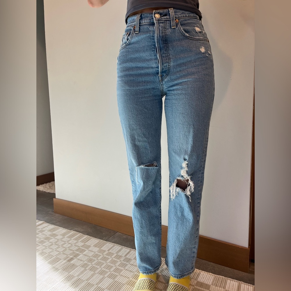 Levi's Blue High Rise Jeans with Distressed Knee